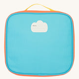 The back of the blue Frugi kids pack a lunch bag in rainbow sun showing the name tag patch on the top