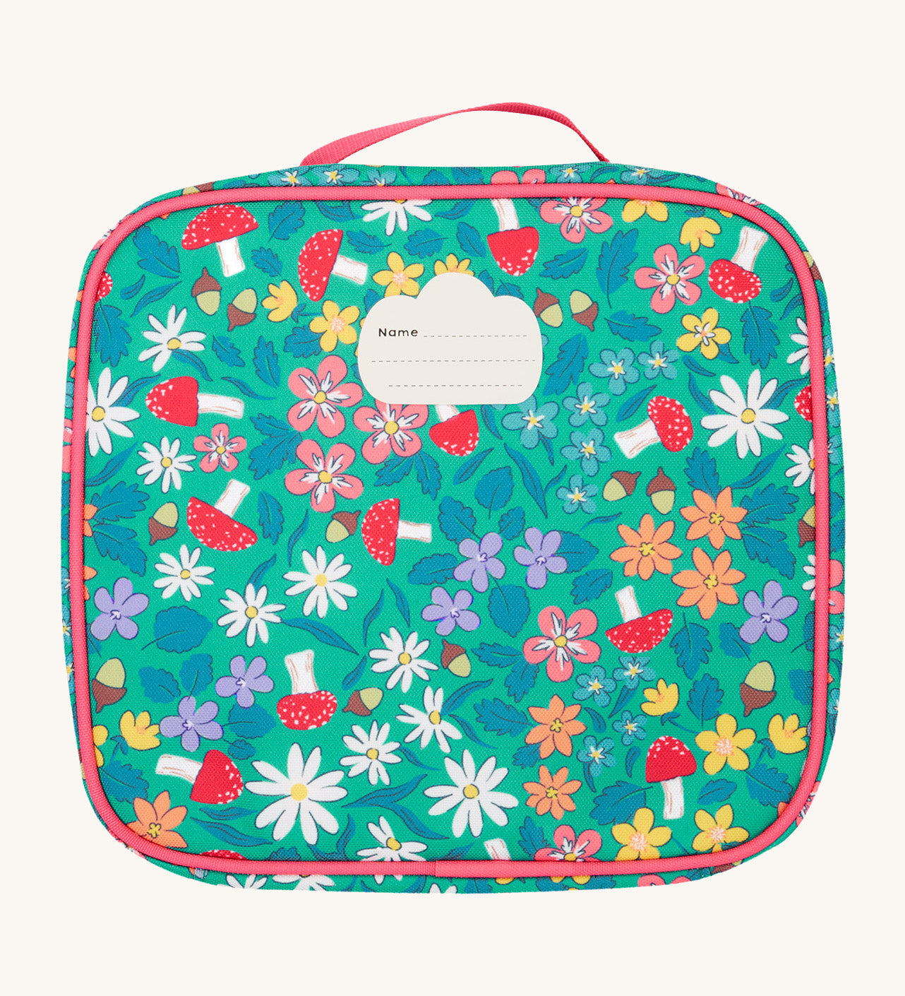 The back of the Frugi kids pack a lunch bag in wild woods showing the name tag patch on the top.