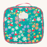 The back of the Frugi kids pack a lunch bag in wild woods showing the name tag patch on the top.