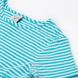A close up of Frugi Pixy Sea Moss Mini Stripe Dress, featuring popper fastenings.