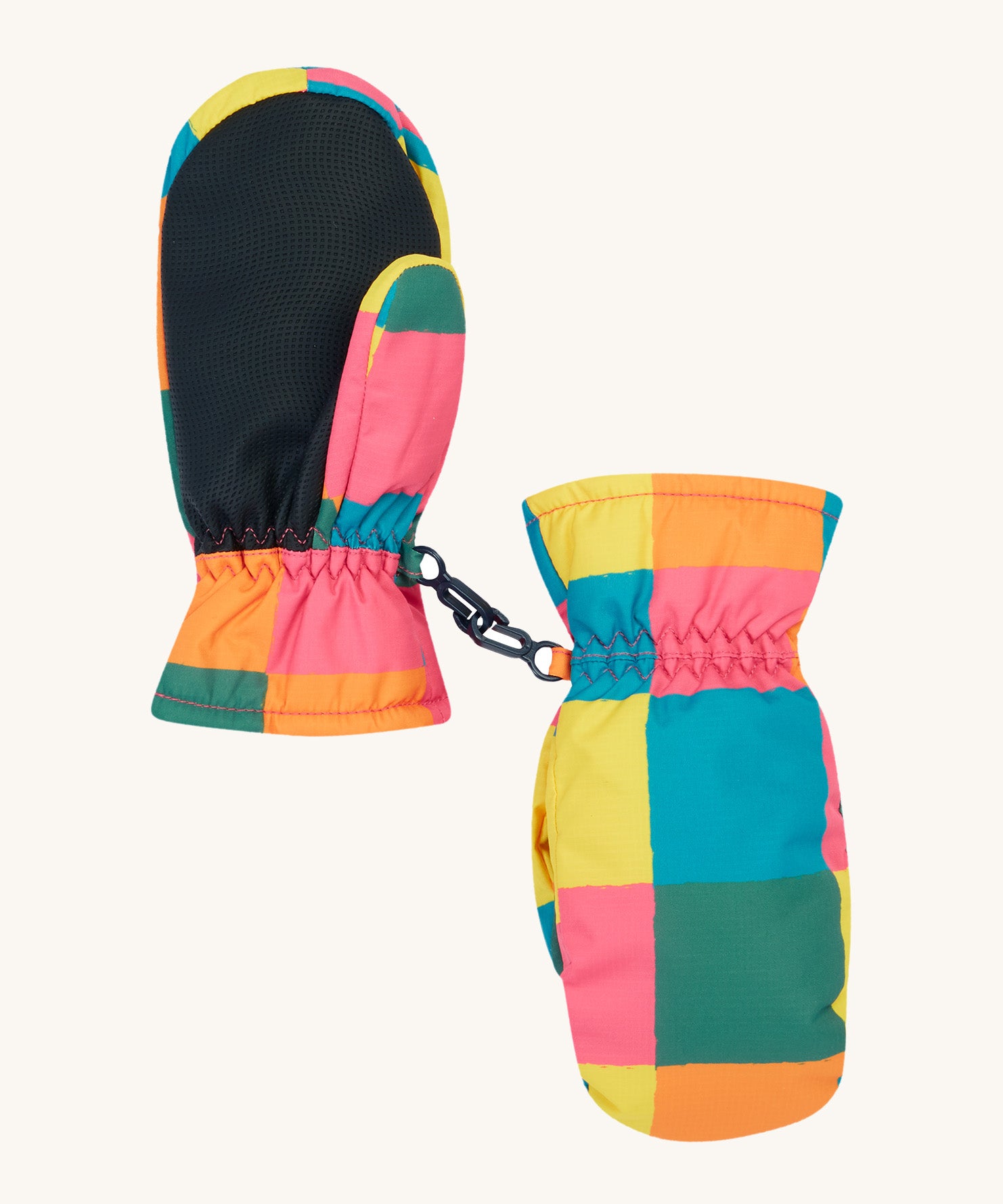 The back of the Frugi kids rainbow check snow mittens. Showing the grippy palm detail on recycled polyester fabric.