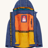Frugi kids 3 in 1 rambler coat in Autumn stripe /navy colourway. A navy waterproof coat from post consumer recycled polyester. Features a removable hood with a fleece liner for warmth, a name tag patch on the inside and a full length zip with popper fasteners