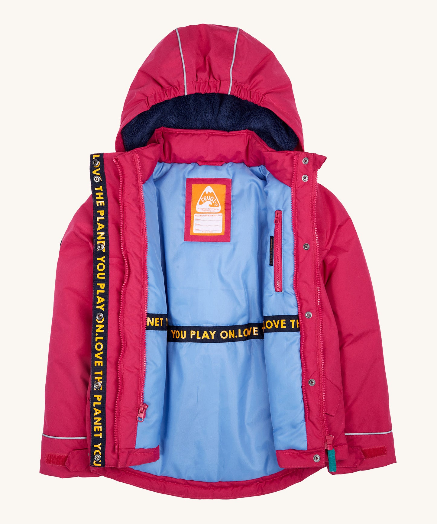 Frugi kids 3 in 1 rambler coat in snapdragon /navy colourway. A waterproof coat from post consumer recycled polyester. Features a removable hood, a full length zip with popper fasteners for a secure fit and a hidden side pocket.