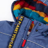 A close up of the Frugi kids 3 in 1 rambler coat in Autumn stripe /navy colourway showing the zip detail and striped fleece liner inner on the hood