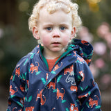 wearing the Frugi Children's Puddle Buster All In One - Tiger Time