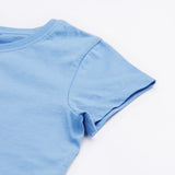 Close up of the Frugi kids cornflower blue, horse t-shirt. Showing the short sleeve detail on light blue organic cotton fabric.