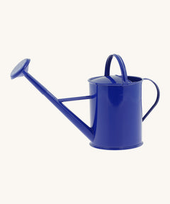 Gluckskafer 1l eco-friendly metal watering can toy in blue with the spout attached to the nozzle