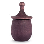 with lid upturned revealing face