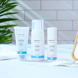 A collection of Green People Organic facial care products, a face mask, foaming face wash and anti-blemish moisturiser.