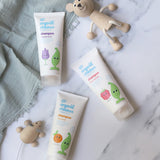 Three tubes of Organic Children shampoo in 3 different scents,  lavender burst, berry smoothie and citrus crush.