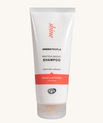 Green People Quinoa & Artichoke protein boost shampoo on a plain background.