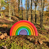Grimm's Wooden Rainbow Medium and Mini on a grey background with Elements and Small Elements