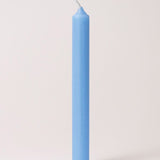 One blue Grimm's 10% beeswax candle.