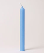 One blue Grimm's 10% beeswax candle.