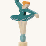 A Grimms wooden ballerina decorative figure in blue. Features a small base on the bottom to slot into the celebration ring.