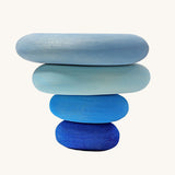 A set of 4 Grimm's wooden pebbles in a blue river colourway.