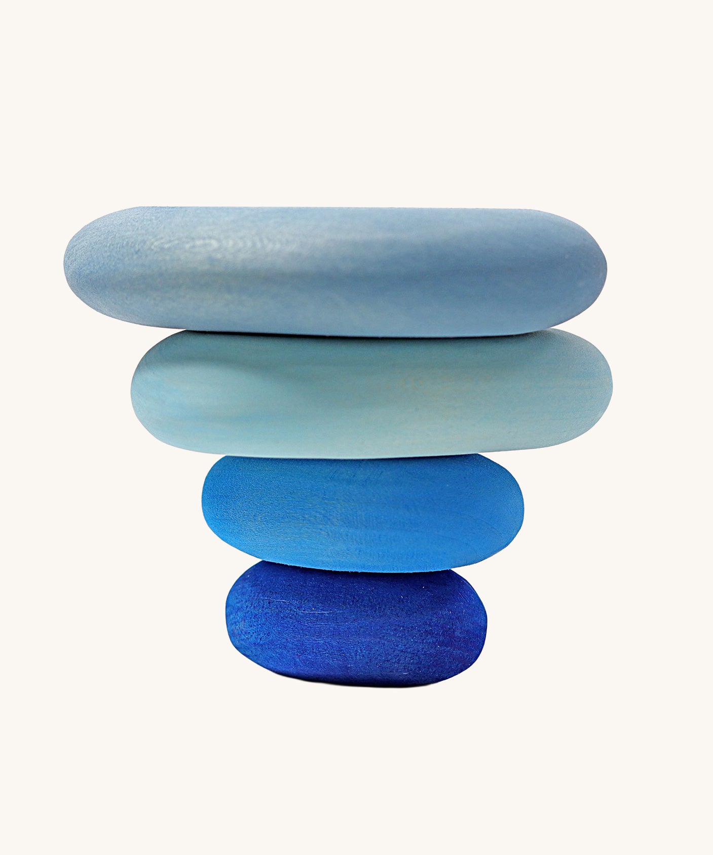 A set of 4 Grimm's wooden pebbles in a blue river colourway.