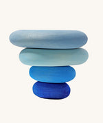 A set of 4 Grimm's wooden pebbles in a blue river colourway.