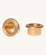 Grimm's brass candle holders to fit celebration rings on a plain background.