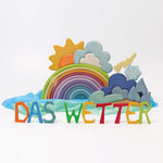 The Grimm's Wooden Weather Building Set set up along side the 12 piece pastel rainbow and free standing letters.