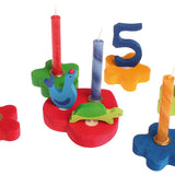 A collection of Grimm's celebration ring pieces, candles and decorative figures. These Waldorf inspired decorative figures are part of a wide range of wooden decorations for celebration rings available here at Babipur.