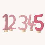 Grimm's Decorative Numbers Set 1-5 in shades of Pink. A wide range of Waldorf inspired celebration rings and decorative figures are available at Babipur.
