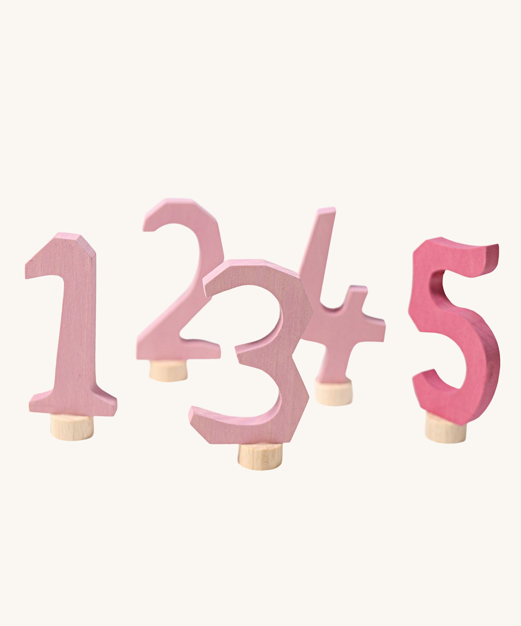 Grimm's Decorative Numbers Set 1-5 in shades of Pink. A wide range of Waldorf inspired celebration rings and decorative figures are available at Babipur.