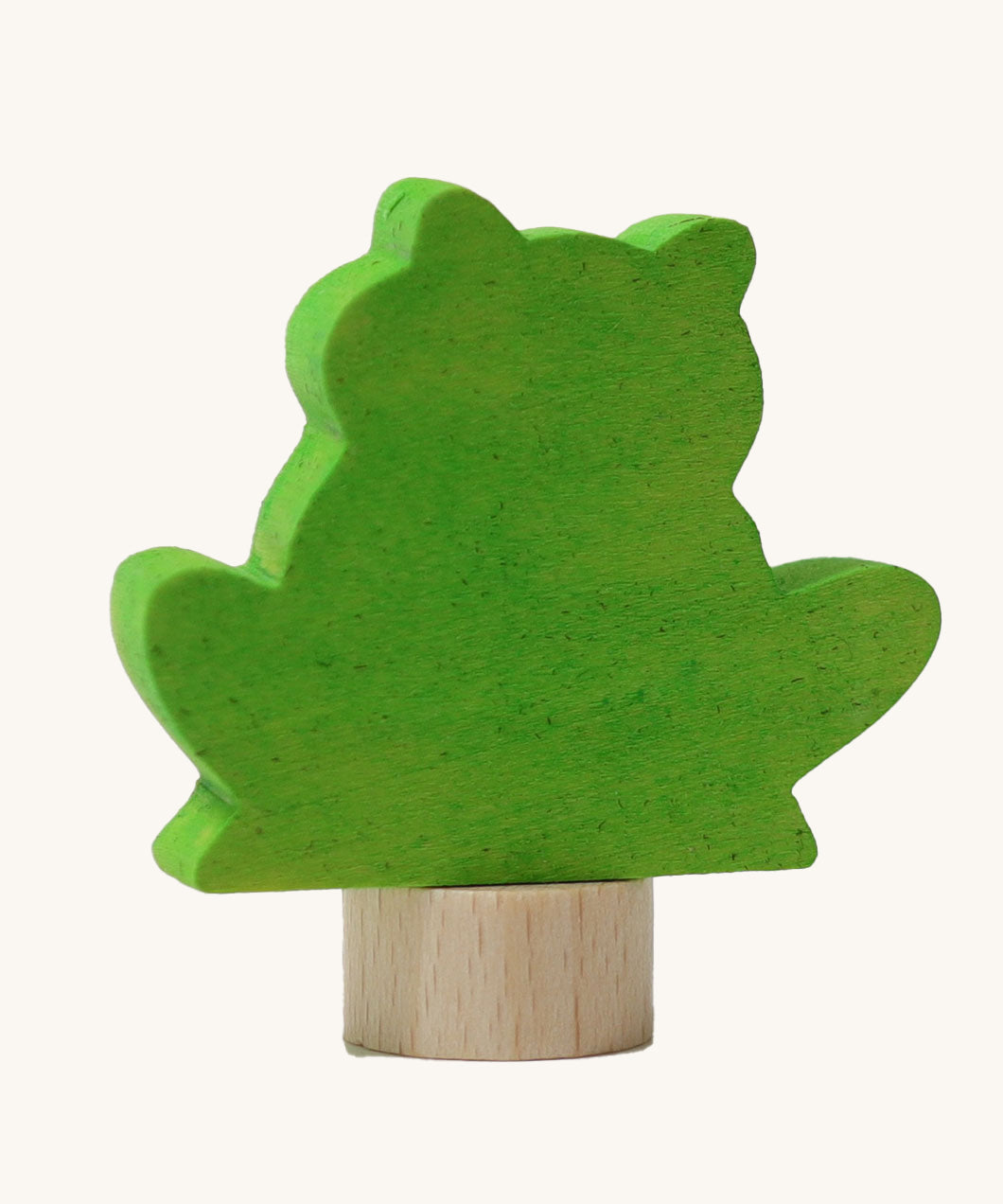 A back view of the Grimms green frog wooden decorative figure showing the small base stand detail