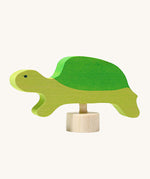 Grimm's Turtle Decorative Figure. A hand decorated wooden figure to fit onto the Grimm's celebration rings. These Waldorf inspired decorative figures are part of a wide range of wooden decorations for celebration rings available here at Babipur.