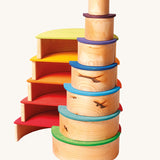 The Grimm's Large Natural Rainbow stacked up with the rainbow semi circles.