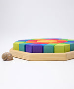 A side view of the tray containing The triangluar shaped blocks from the Grimm's Octagon Puzzles.