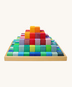 Grimm's rainbow coloured Large Stepped Pyramid wooden toy building block set. These Grimm's toys are part of a wide range of wooden toys available here at Babipur.