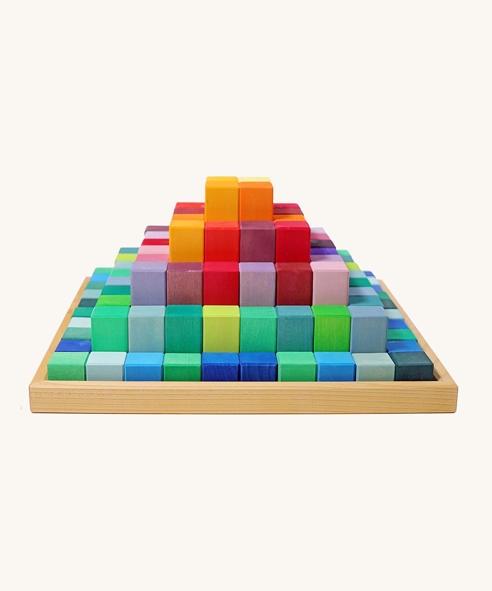 Grimm's rainbow coloured Large Stepped Pyramid wooden toy building block set. These Grimm's toys are part of a wide range of wooden toys available here at Babipur.