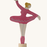 A Grimms pink ballerina decorative figure. Features a small base stand on the bottom to slot into a decorative figure
