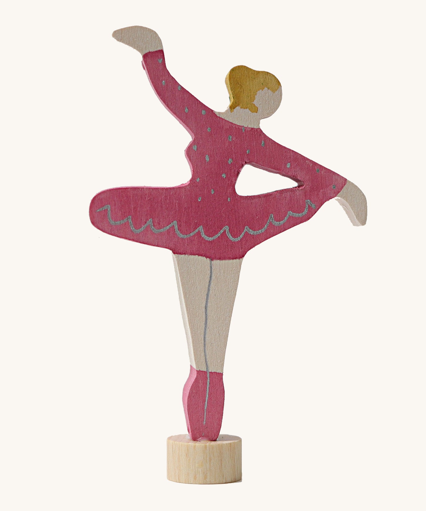 A Grimms pink ballerina decorative figure. Features a small base stand on the bottom to slot into a decorative figure