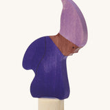 A Grimms wooden gnome decorative figure in purple. Features a small base stand to slot in the celebration ring