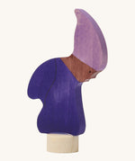 A Grimms wooden gnome decorative figure in purple. Features a small base stand to slot in the celebration ring