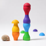 Grimm's Rainbow Mushrooms Sorting Game, the pieces have been stacked on top of each other to create little towers.