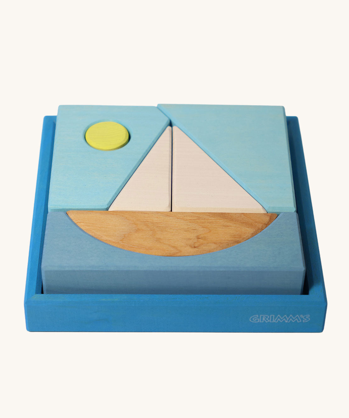 Grimm's Building Set Blue. A set of wooden blocks that form a sailing boat when placed in the blue coloured storage tray. These Grimm's wooden block sets are part of a wide range of wooden toys available here at Babipur.