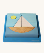 Grimm's Building Set Blue. A set of wooden blocks that form a sailing boat when placed in the blue coloured storage tray. These Grimm's wooden block sets are part of a wide range of wooden toys available here at Babipur.