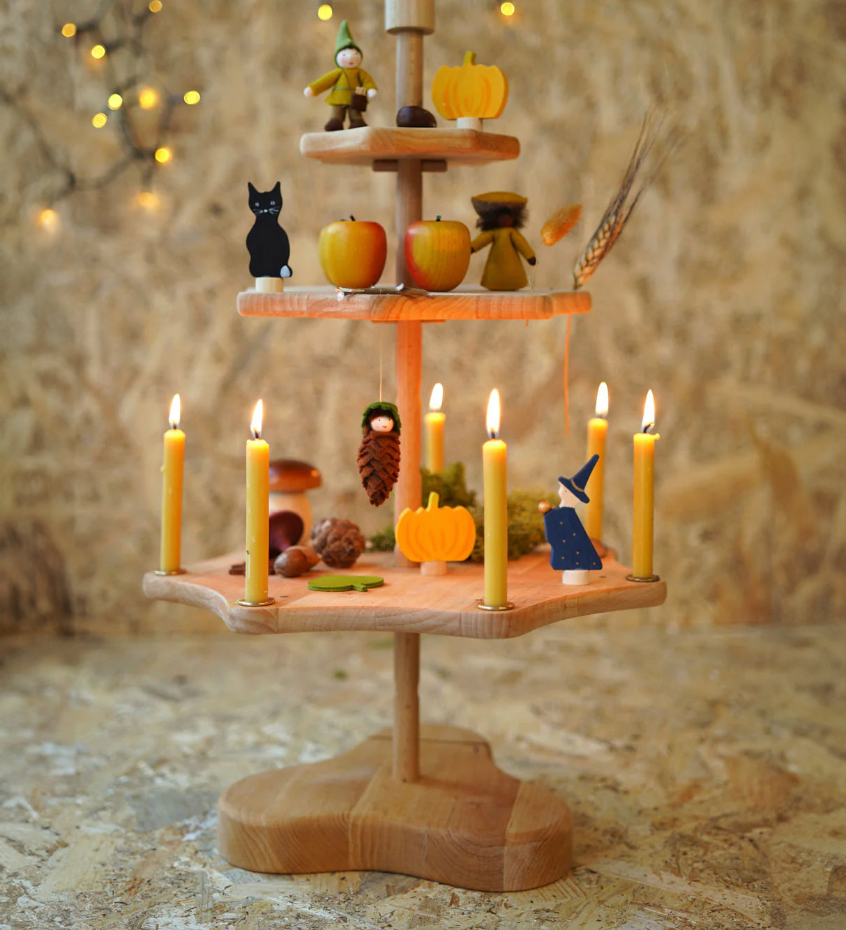 A Grimm's Seasonal Festivity Stand decorated with Autumn and Halloween themed items.