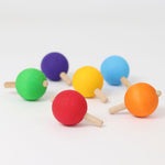 The six pastel rainbow traditional wooden spinning tops from Grimm's
