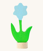 Grimms wooden blue flower decorative figure with green stem and leaves. Features a small base stand on the bottom to slot in the celebration ring