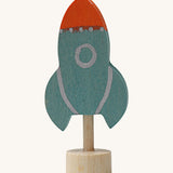 A Grimms blue wooden decorative figure with a red nose. Features a little base stand to slot into a decorative ring