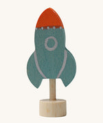 A Grimms blue wooden decorative figure with a red nose. Features a little base stand to slot into a decorative ring