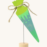 Grimms wooden neon green sweet cone decorative figure. Features a twine ribbon and standing on a metal wire and small base stand to slot in a celebration ring