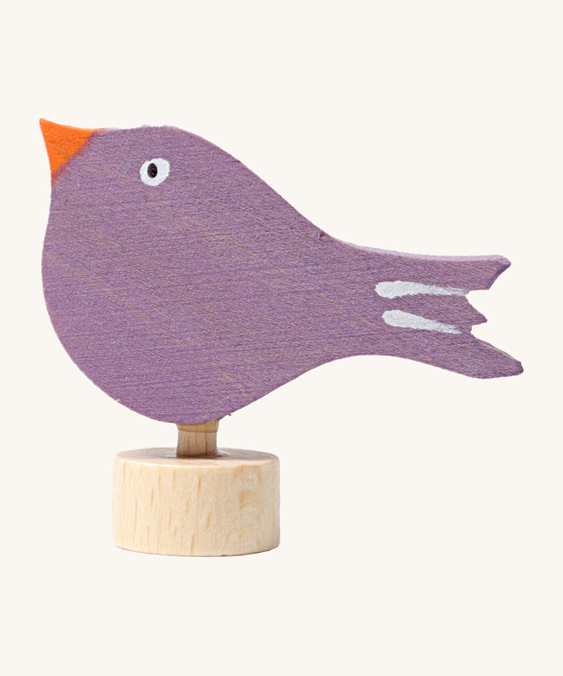 Grimms wooden purple singing bird with hand painted facial features standing on  a small base stand to slot in the celebration ring or stand