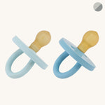 Hevea Bumibebe natural rubber round dummies in blue on a beige background