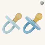 Hevea Bumibebe natural rubber round dummies in blue on a beige background
