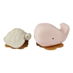 A picture of the Hevea Squeeze'n'splash Whale & Turtle rubber Bath toys in Champagne Pink and Vanilla